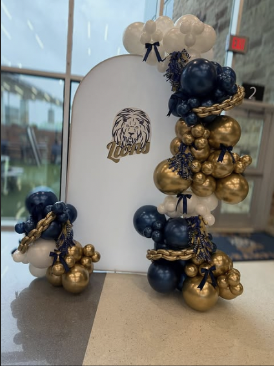 Navy and gold balloon column with party panel